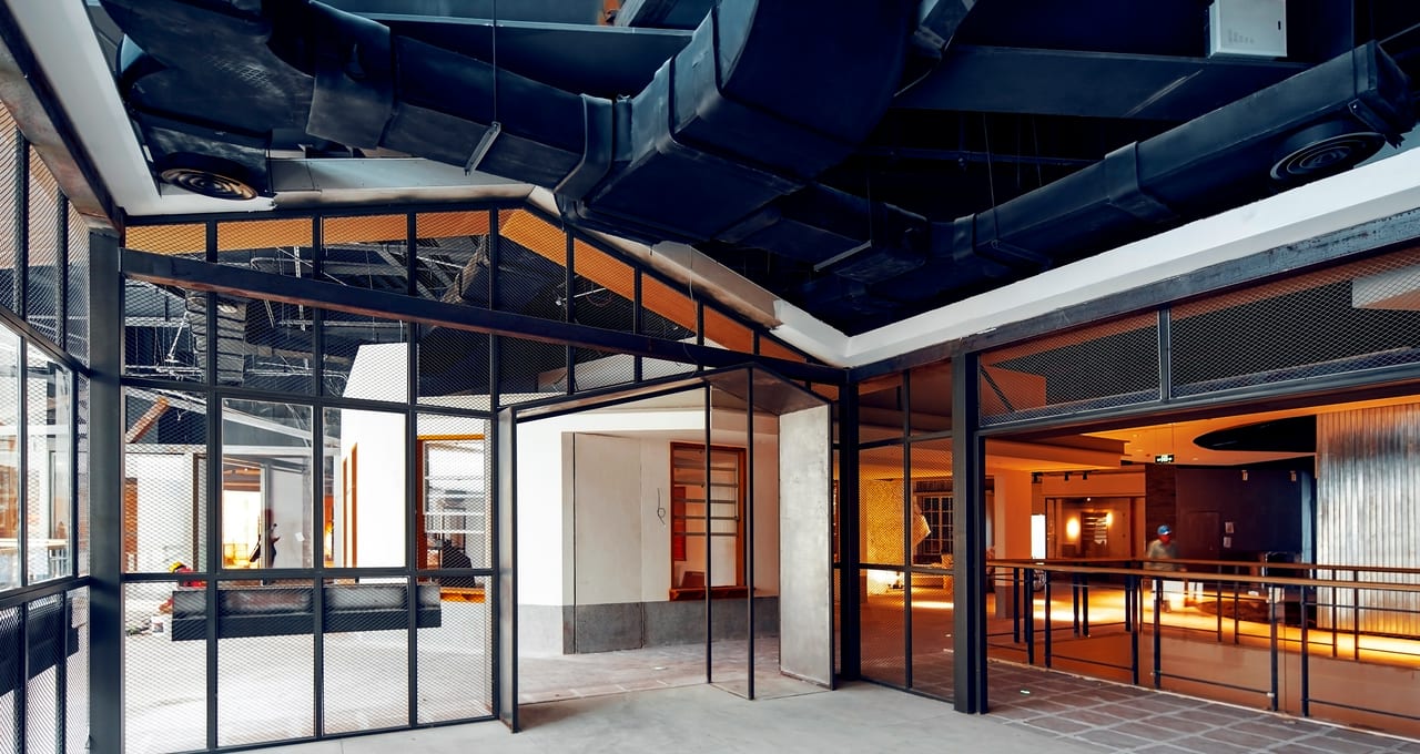 Modern commercial glass partitions and office interior installed by Glass and Door Pro in Charlotte, NC